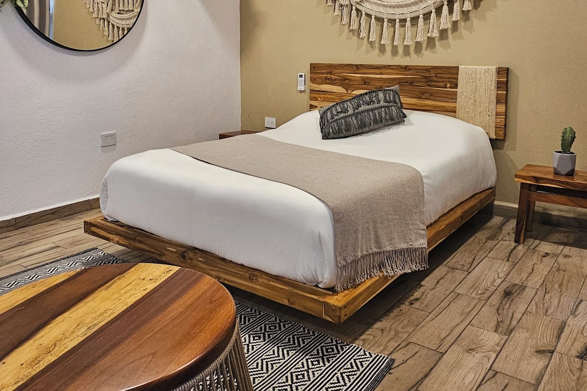 Apartment, Pool View | 1 bedroom, down comforters, in-room safe, laptop workspace