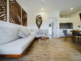 Apartamento, vista para o mar | Área de estar