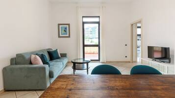 Apartment, Kitchen, City View | Living area | 32-inch Smart TV with digital channels