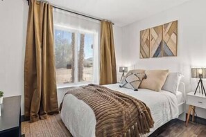 4 bedrooms, iron/ironing board, travel crib, internet