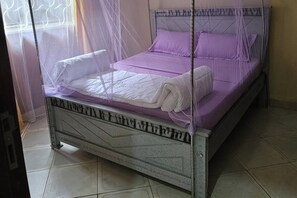 1 غرفة نوم ومكواة/لوح كي وواي فاي وملاءات أسرّة