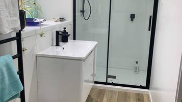 Hair dryer, towels, soap, toilet paper