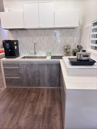 Fridge, stovetop, cookware/dishes/utensils, spices. 7pax 2-bedroom house with WiFi and AC in lovely Bukit Mertajam@Near AEON