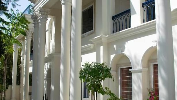 A white building with columns and balconies. - Dileep Kothi A Royal Boutique Luxury  (Jaipur)