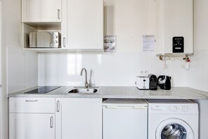 Fridge, microwave, coffee/tea maker, toaster