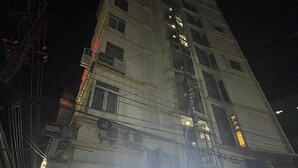 The exterior of the Royal Palm Hotel at night, featuring its name prominently displayed on the facade. - Hotel Royal Palm (Sylhet)