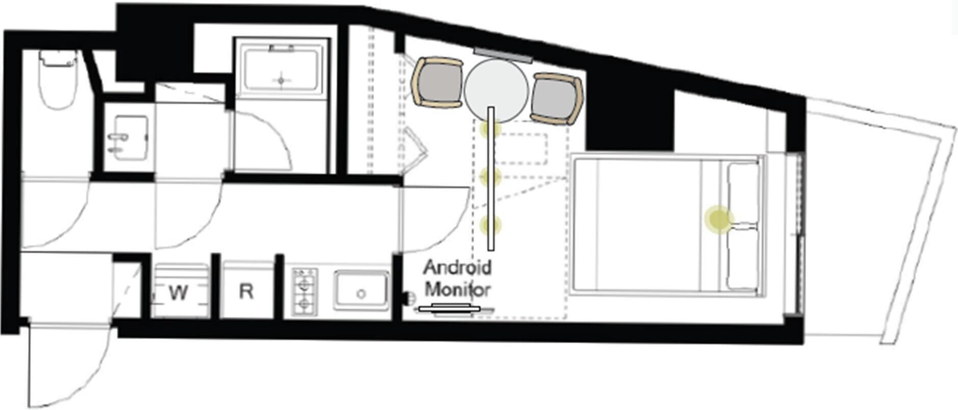 A floor plan with a kitchen, dining area, and a bathroom.