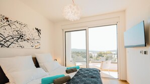 4 habitaciones, tabla de planchar con plancha y cuna de viaje 