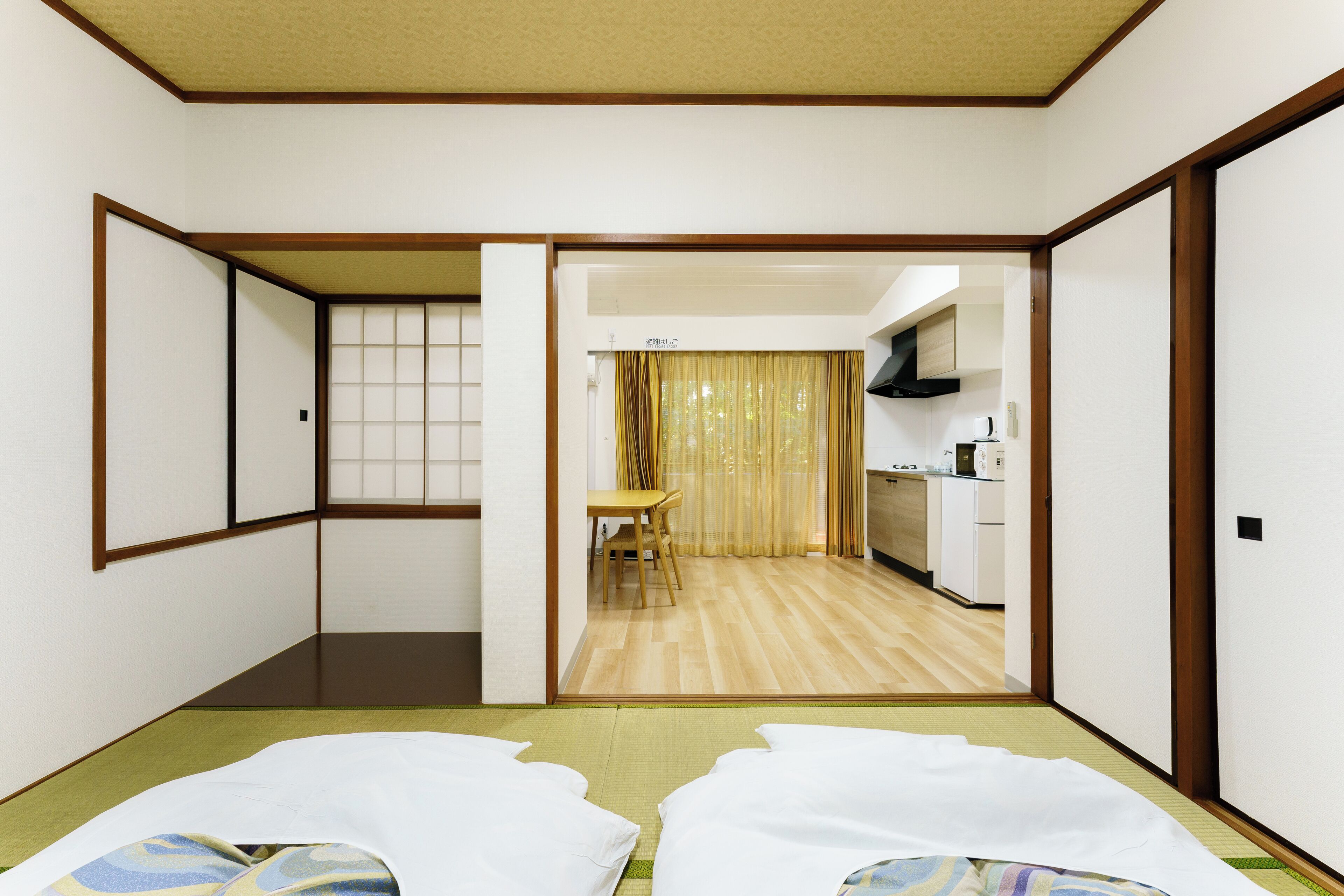 Premium bedding, laptop workspace, blackout curtains, iron/ironing board