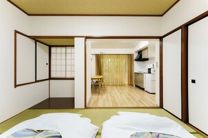 Premium bedding, laptop workspace, blackout drapes, iron/ironing board