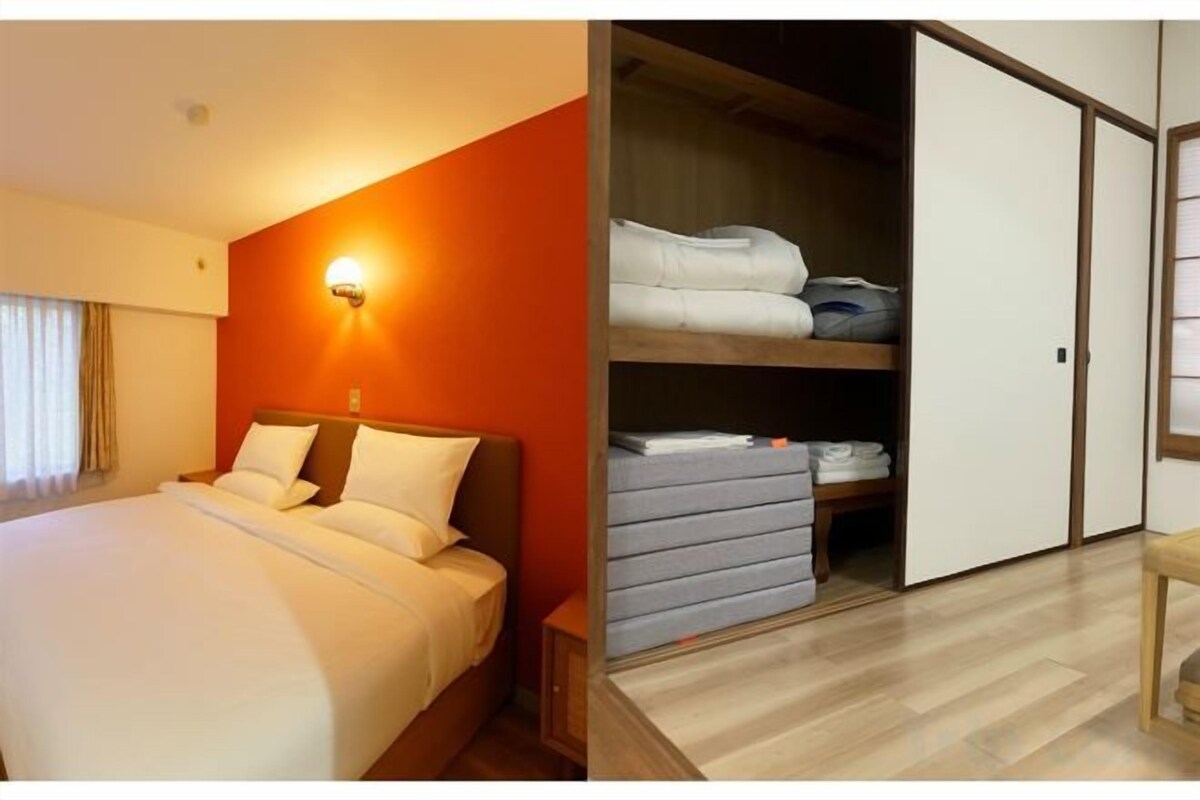 Premium bedding, laptop workspace, blackout drapes