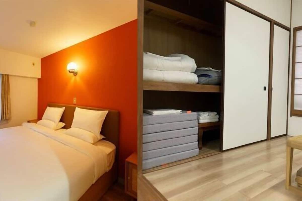 Premium bedding, laptop workspace, blackout drapes