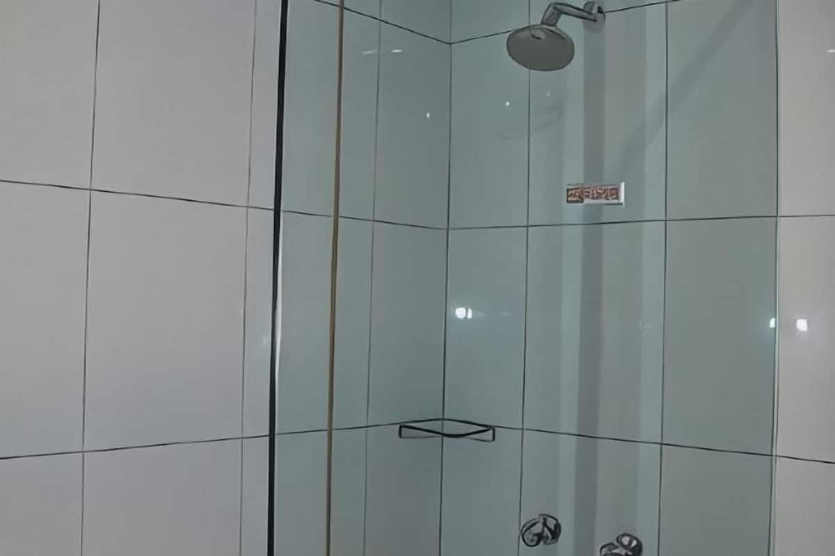 Bathroom | Shower, hair dryer, towels, soap