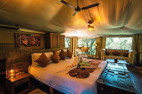 In-room safe, desk, laptop workspace, blackout curtains. Ilora Retreats