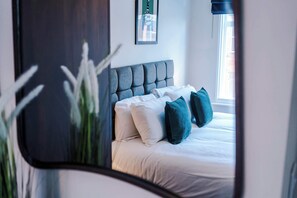 1 slaapkamer, een strijkplank/strijkijzer, wifi, beddengoed