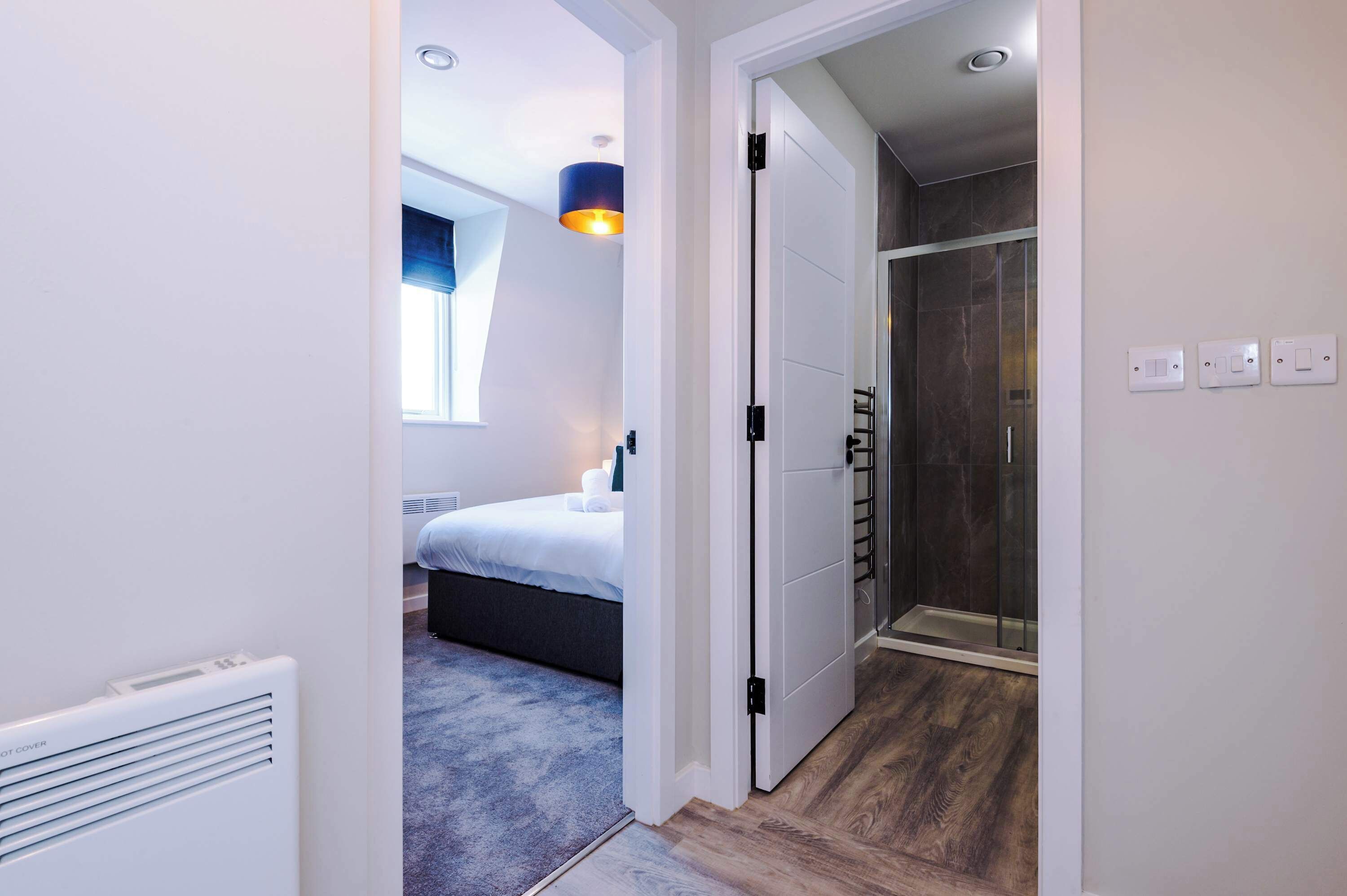 Shower, hair dryer, towels, shampoo
