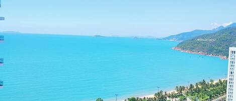 Suíte luxo, 3 quartos | Vista para praia/oceano