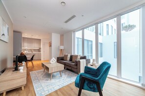 Apartment | Living area | 37-inch TV with cable channels, Netflix, streaming services