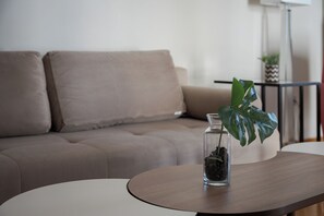 Apartment, Balcony | Living area | 50-inch flat-screen TV with satellite channels - Athenian Heritage Residences (Athens)