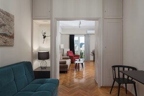 Apartment, Balcony | Living area | 50-inch flat-screen TV with satellite channels - Athenian Heritage Residences (Athens)