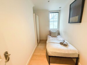 2 bedrooms, desk, iron/ironing board, travel crib