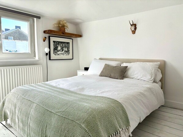 2 habitaciones, tabla de planchar con plancha y wifi gratis 