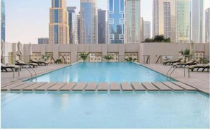 Pool - Free housekeeping visits during your stay - StayShort - Cozy 1-Bedroom Apartment at West Avenue Tower near Marina beach! (Dubai)