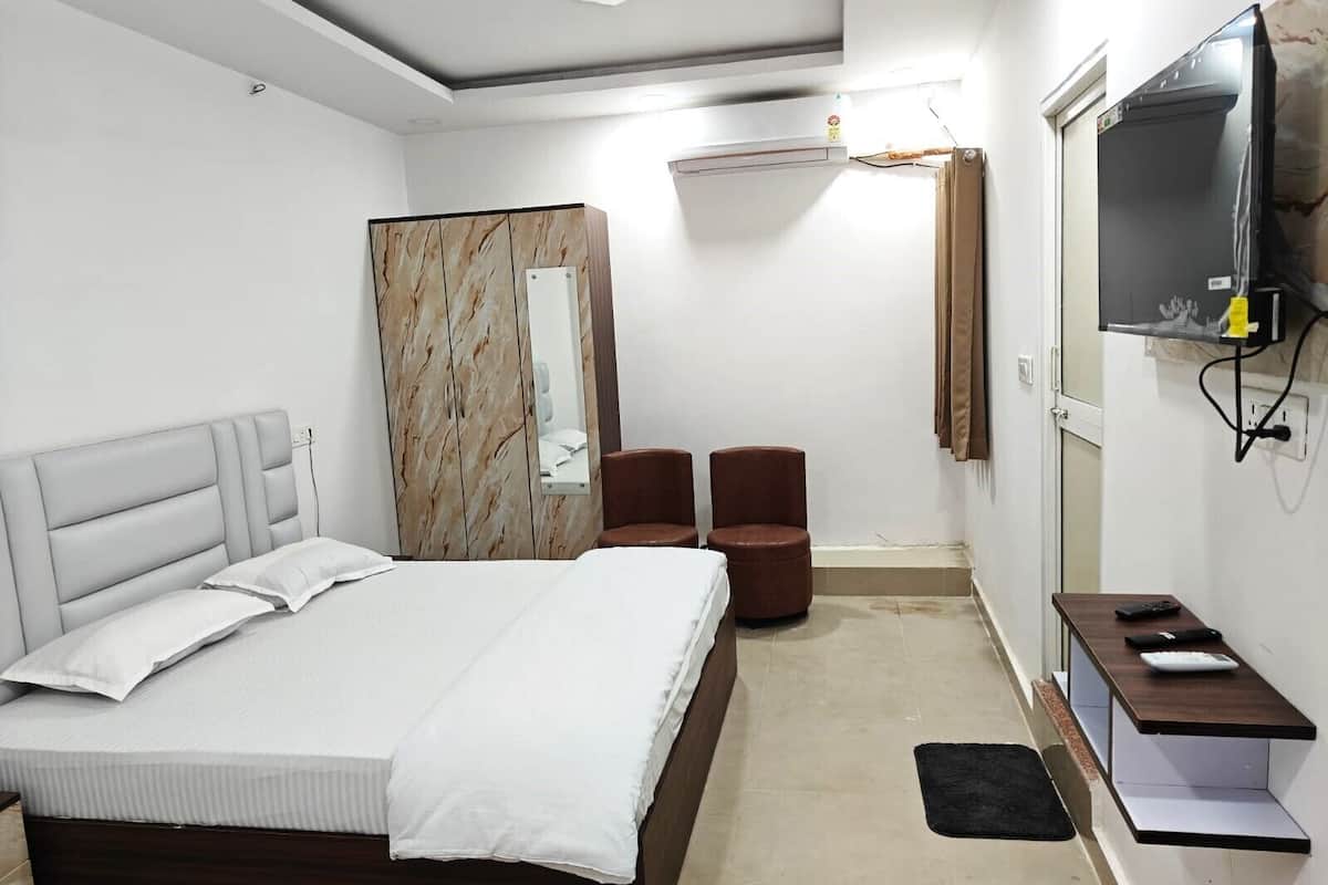 Habitación Deluxe con 1 cama matrimonial o 2 individuales, balcón, vista a la ciudad | Wifi gratis