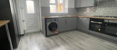 Apartment | Private kitchen | Fridge, microwave, oven, stovetop