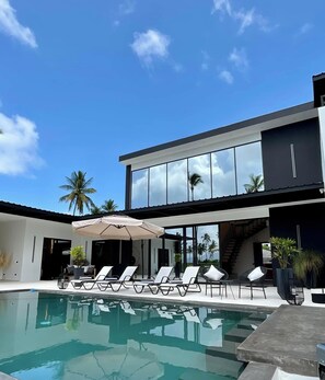 Outdoor pool, pool umbrellas, sun loungers