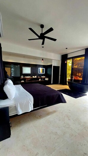 Deluxe Villa, Beach View | 4 bedrooms, down comforters, in-room safe, blackout drapes