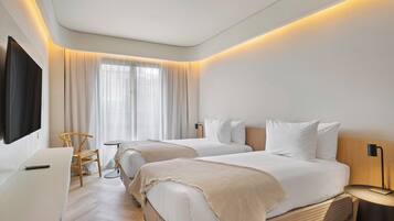 Ropa de cama de alta calidad y minibar