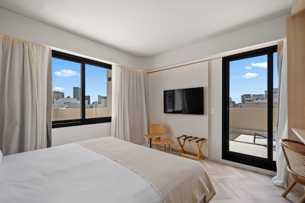 Superior Studio Suite, City View | Premium bedding, minibar, in-room safe, desk