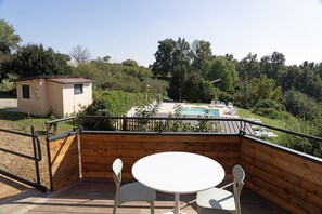 Casa de árbol, vista a la alberca | Terraza o patio
