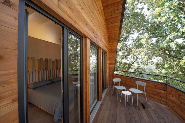 Casa de árbol, vista a la alberca | Terraza o patio