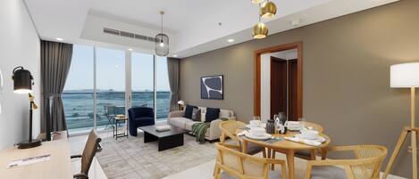 Deluxe-Apartment, 1 King-Bett und Schlafsofa, Balkon | Wohnbereich