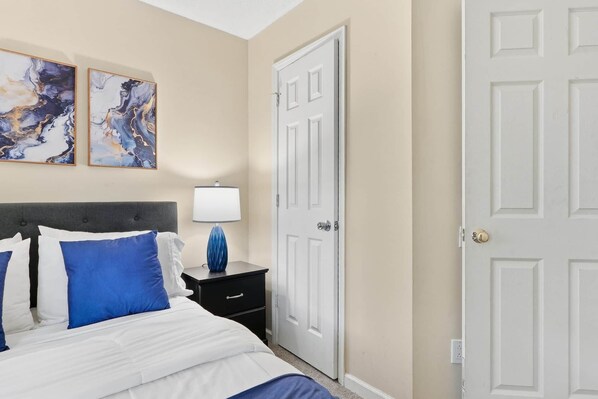 Blue bedroom with closet