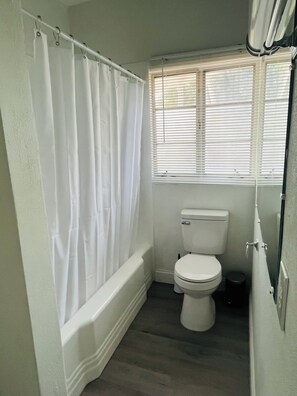 Hair dryer, towels, soap, toilet paper