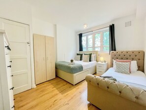 3 bedrooms, desk, iron/ironing board, travel cot