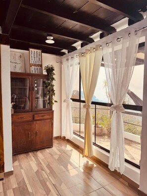 Basic Apartment, Lake View | Living area - Bistro La Petite (San Francisco Chinameca)