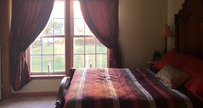 2nd-floor guestroom with attached bath
