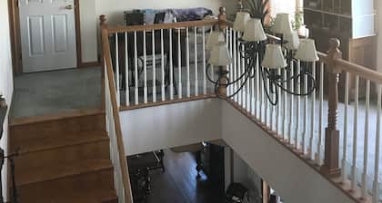 2nd-floor guestroom with attached bath
