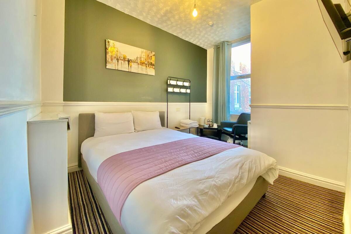 Blackout curtains, iron/ironing board, free WiFi, bed sheets