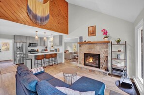 Smart TV, fireplace, foosball, books