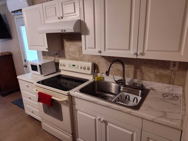 Microwave, oven, stovetop, coffee/tea maker