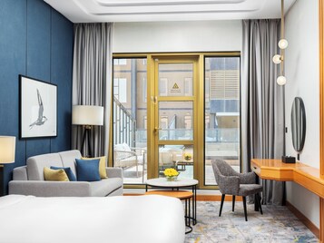 Free minibar items, in-room safe, desk, laptop workspace