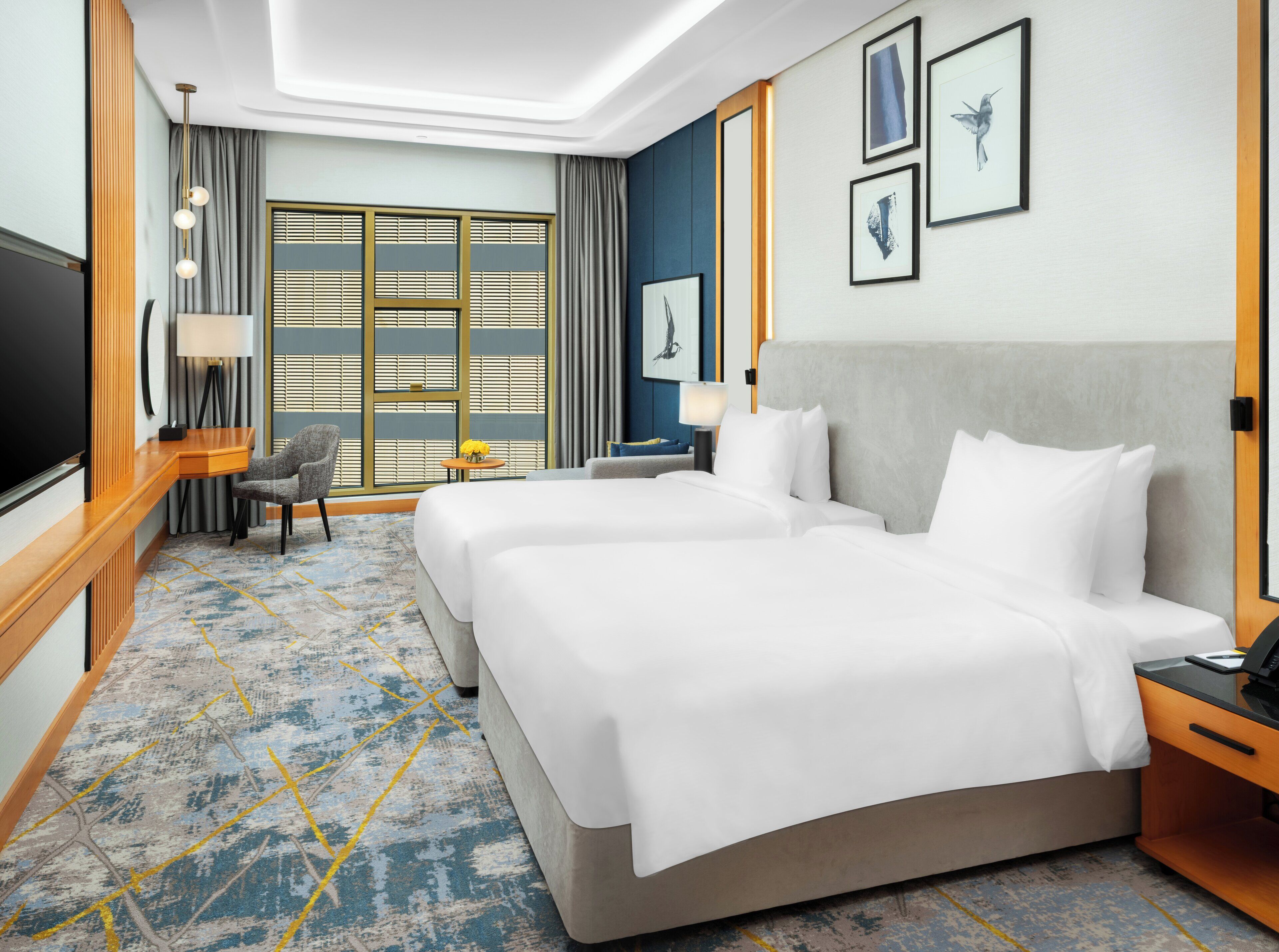 Grand Room, 2 Single Beds, Pool View | Free minibar items, in-room safe, desk, laptop workspace
