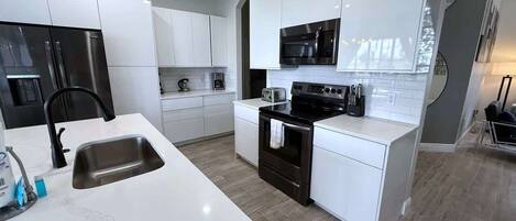 House, Multiple Beds, Pool Access, Pool View | Private kitchen