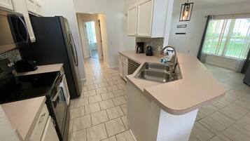 House, Multiple Beds, Pool Access, Pool View | Private kitchen | Coffee/tea maker, electric kettle