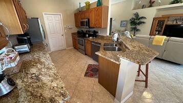 House, Multiple Beds, Pool Access, Pool View | Private kitchen | Electric kettle